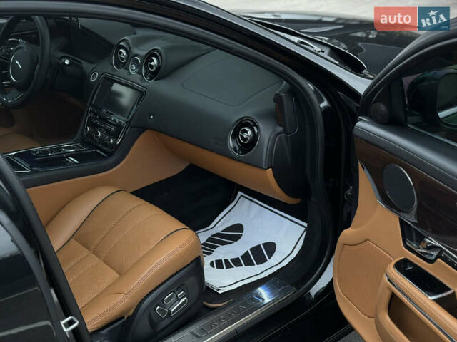 Черный Ягуар Икс Джей, объемом двигателя 5 л и пробегом 125 тыс. км за 20500 $, фото 42 на Automoto.ua