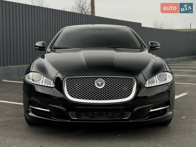 Черный Ягуар Икс Джей, объемом двигателя 5 л и пробегом 125 тыс. км за 20500 $, фото 7 на Automoto.ua