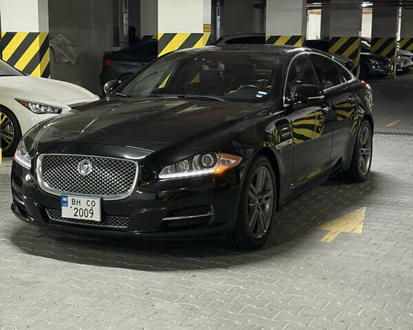 Черный Ягуар Икс Джей, объемом двигателя 2.97 л и пробегом 171 тыс. км за 17499 $, фото 2 на Automoto.ua