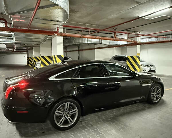 Черный Ягуар Икс Джей, объемом двигателя 2.97 л и пробегом 171 тыс. км за 17499 $, фото 7 на Automoto.ua