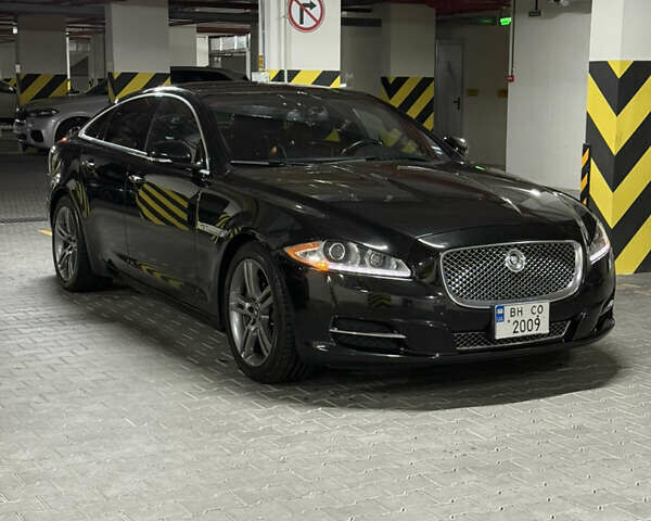 Черный Ягуар Икс Джей, объемом двигателя 2.97 л и пробегом 171 тыс. км за 17499 $, фото 1 на Automoto.ua