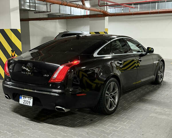 Черный Ягуар Икс Джей, объемом двигателя 2.97 л и пробегом 171 тыс. км за 17499 $, фото 6 на Automoto.ua