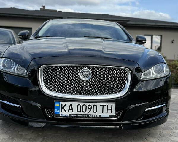 Черный Ягуар Икс Джей, объемом двигателя 3 л и пробегом 87 тыс. км за 26999 $, фото 1 на Automoto.ua