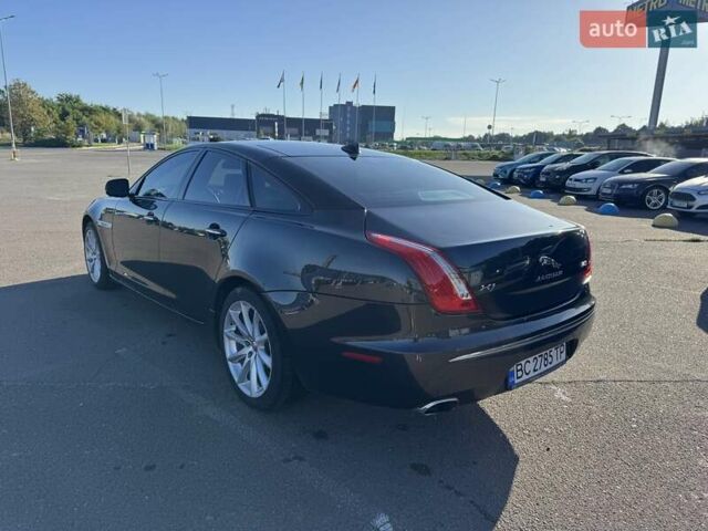 Чорний Ягуар Ікс Джей, об'ємом двигуна 3 л та пробігом 176 тис. км за 14500 $, фото 4 на Automoto.ua