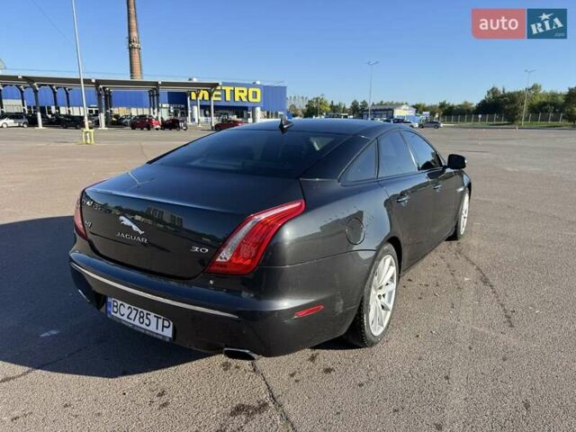 Чорний Ягуар Ікс Джей, об'ємом двигуна 3 л та пробігом 176 тис. км за 14500 $, фото 6 на Automoto.ua