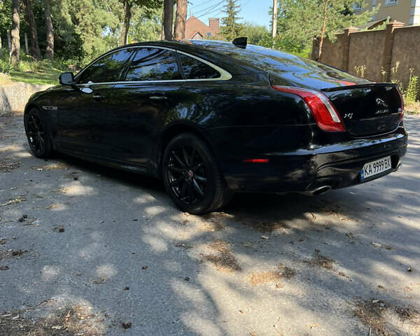 Черный Ягуар Икс Джей, объемом двигателя 2.97 л и пробегом 116 тыс. км за 22000 $, фото 5 на Automoto.ua