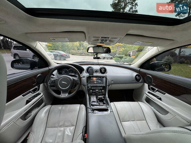 Чорний Ягуар Ікс Джей, об'ємом двигуна 3 л та пробігом 110 тис. км за 18600 $, фото 2 на Automoto.ua