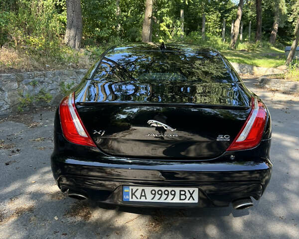 Черный Ягуар Икс Джей, объемом двигателя 2.97 л и пробегом 116 тыс. км за 22000 $, фото 2 на Automoto.ua