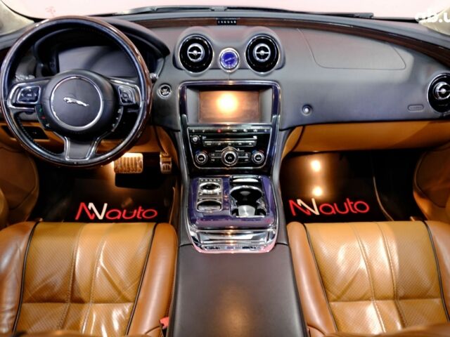 Красный Ягуар Икс Джей, объемом двигателя 5 л и пробегом 133 тыс. км за 13900 $, фото 6 на Automoto.ua