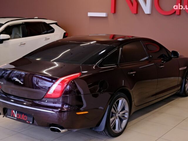 Красный Ягуар Икс Джей, объемом двигателя 5 л и пробегом 133 тыс. км за 13900 $, фото 4 на Automoto.ua