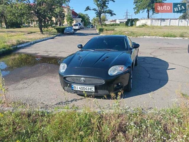 Черный Ягуар ХК, объемом двигателя 4.2 л и пробегом 65 тыс. км за 21000 $, фото 6 на Automoto.ua