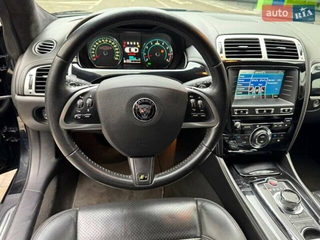 Черный Ягуар ХК, объемом двигателя 5 л и пробегом 65 тыс. км за 27990 $, фото 18 на Automoto.ua