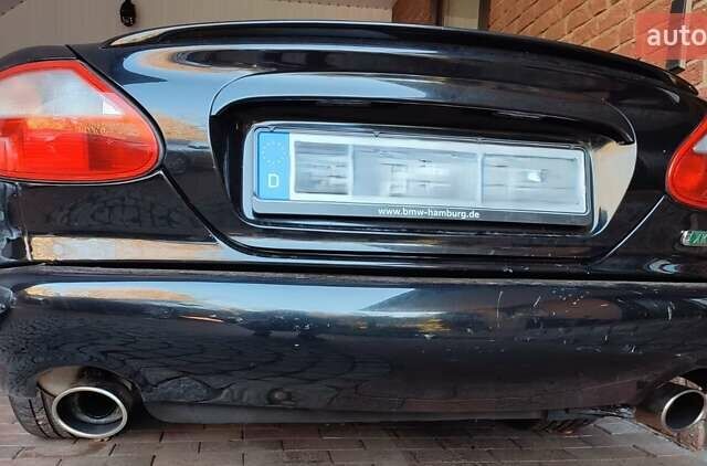 Синий Ягуар ХК, объемом двигателя 4 л и пробегом 999 тыс. км за 20960 $, фото 2 на Automoto.ua