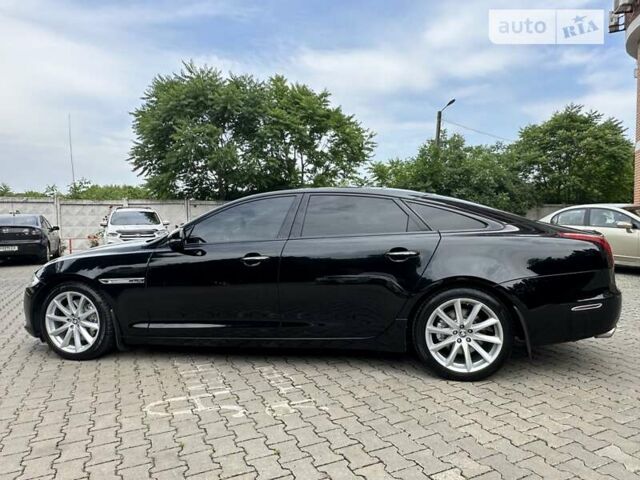 Черный Ягуар XJL, объемом двигателя 5 л и пробегом 174 тыс. км за 16300 $, фото 11 на Automoto.ua