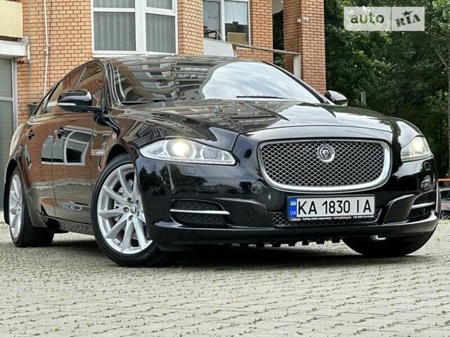 Черный Ягуар XJL, объемом двигателя 5 л и пробегом 174 тыс. км за 16300 $, фото 1 на Automoto.ua