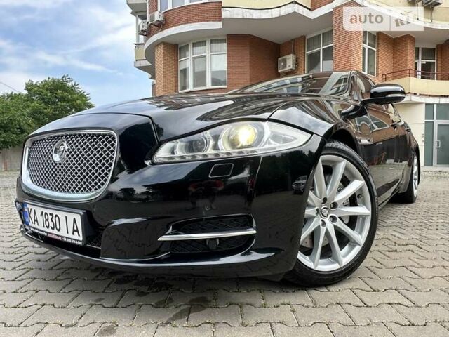 Черный Ягуар XJL, объемом двигателя 5 л и пробегом 174 тыс. км за 16300 $, фото 12 на Automoto.ua