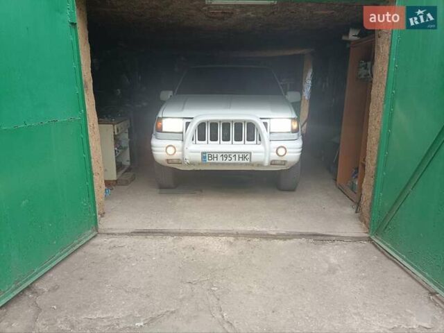 Білий Джип Cherokee, об'ємом двигуна 4 л та пробігом 200 тис. км за 5300 $, фото 22 на Automoto.ua