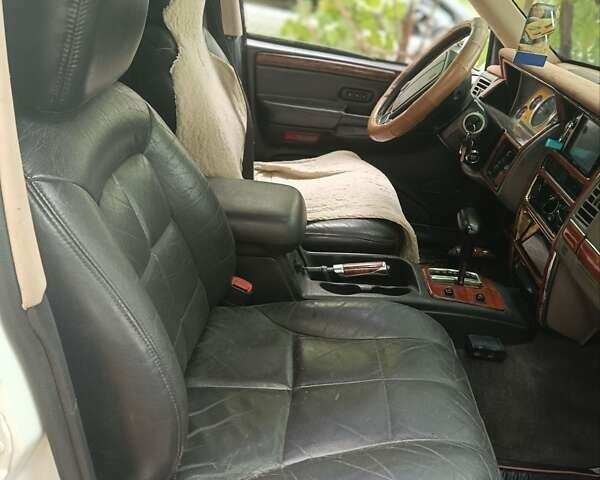 Білий Джип Cherokee, об'ємом двигуна 4 л та пробігом 200 тис. км за 5300 $, фото 3 на Automoto.ua