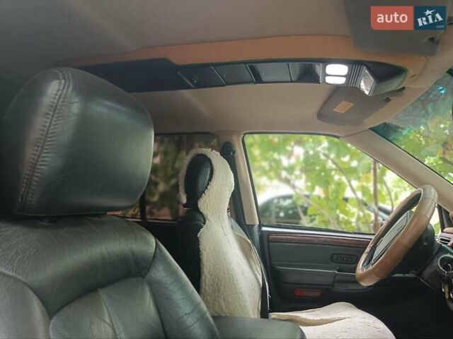 Білий Джип Cherokee, об'ємом двигуна 4 л та пробігом 200 тис. км за 5300 $, фото 10 на Automoto.ua