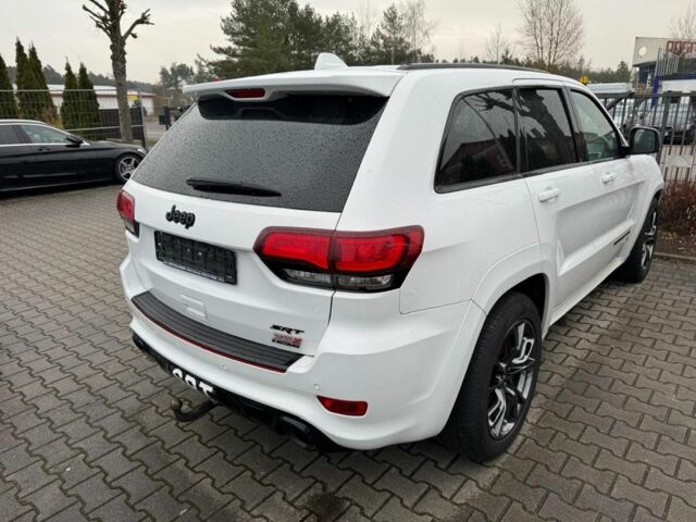 Белый Джип Чероки, объемом двигателя 6.4 л и пробегом 145 тыс. км за 30145 $, фото 1 на Automoto.ua