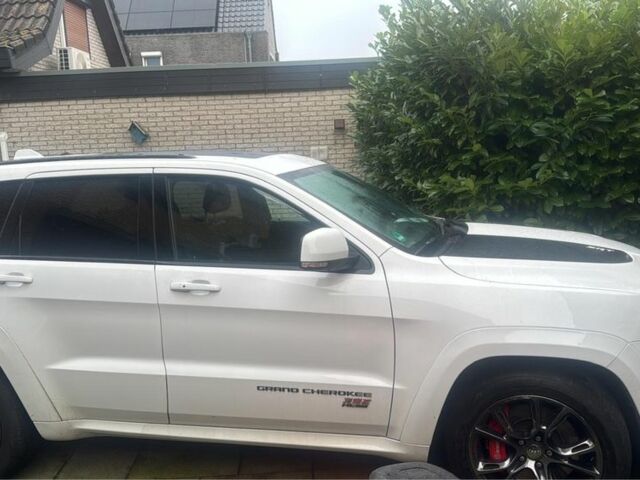 Белый Джип Чероки, объемом двигателя 6.4 л и пробегом 145 тыс. км за 30145 $, фото 2 на Automoto.ua