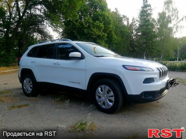 Білий Джип Cherokee, об'ємом двигуна 2.4 л та пробігом 202 тис. км за 12200 $, фото 1 на Automoto.ua