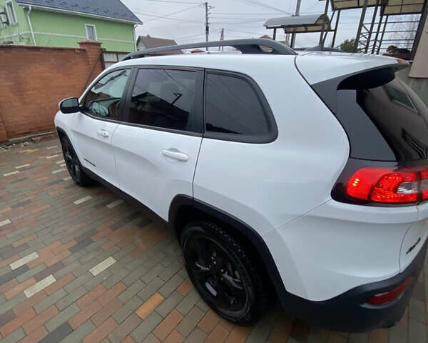 Білий Джип Cherokee, об'ємом двигуна 2.36 л та пробігом 80 тис. км за 16700 $, фото 11 на Automoto.ua