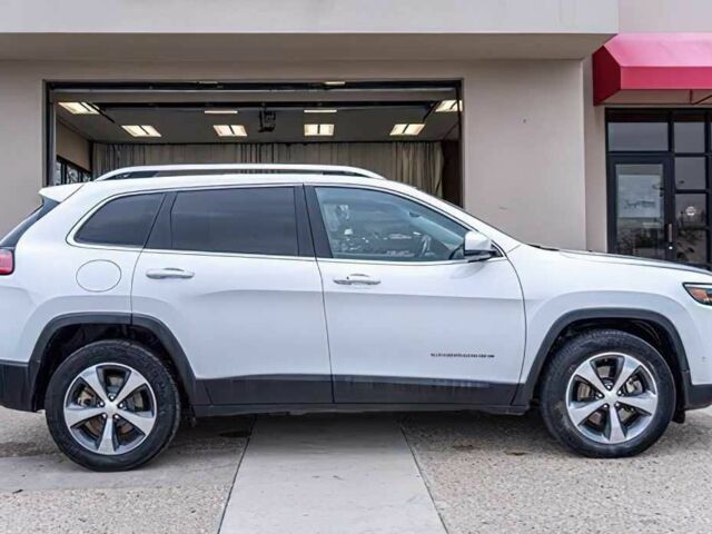 Білий Джип Cherokee, об'ємом двигуна 2 л та пробігом 147 тис. км за 13500 $, фото 3 на Automoto.ua