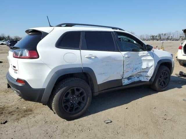 Білий Джип Cherokee, об'ємом двигуна 0.32 л та пробігом 89 тис. км за 13000 $, фото 2 на Automoto.ua