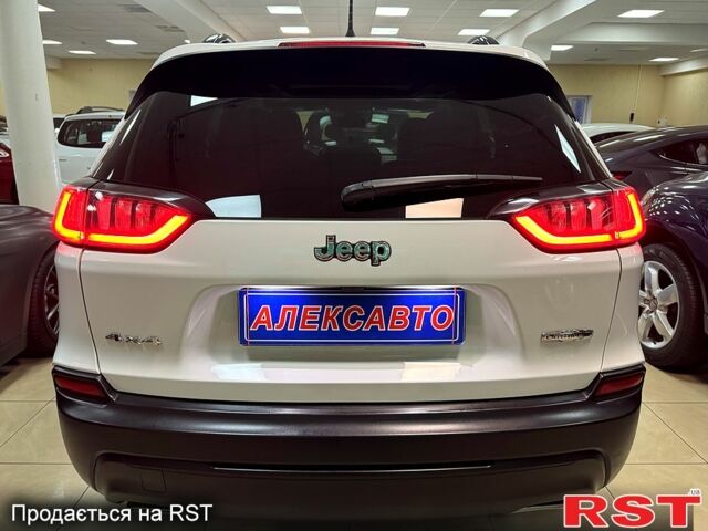 Білий Джип Cherokee, об'ємом двигуна 2 л та пробігом 19 тис. км за 24900 $, фото 3 на Automoto.ua