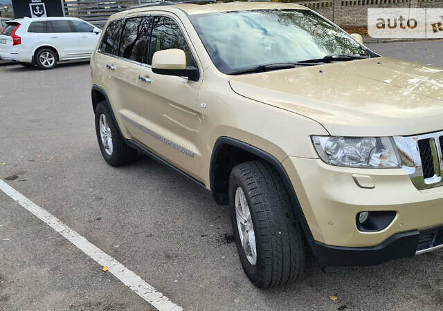 Бежевий Джип Cherokee, об'ємом двигуна 3 л та пробігом 165 тис. км за 19500 $, фото 3 на Automoto.ua