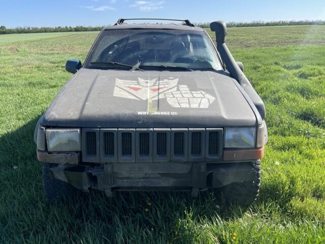 Черный Джип Чероки, объемом двигателя 4 л и пробегом 200 тыс. км за 2500 $, фото 1 на Automoto.ua