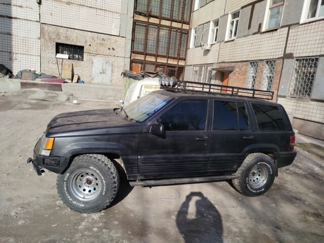 Черный Джип Чероки, объемом двигателя 4 л и пробегом 315 тыс. км за 3700 $, фото 2 на Automoto.ua