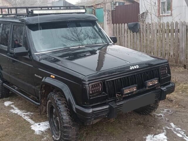 Черный Джип Чероки, объемом двигателя 4 л и пробегом 235 тыс. км за 2200 $, фото 1 на Automoto.ua