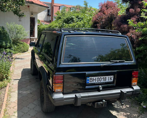 Черный Джип Чероки, объемом двигателя 2.1 л и пробегом 100 тыс. км за 12000 $, фото 9 на Automoto.ua