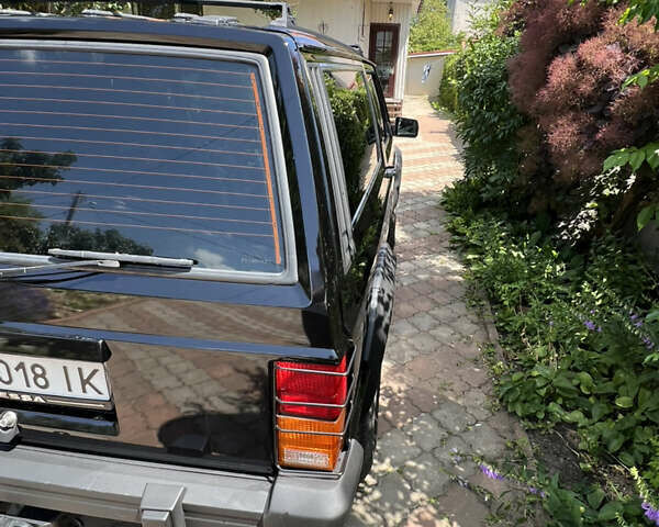 Черный Джип Чероки, объемом двигателя 2.1 л и пробегом 100 тыс. км за 12000 $, фото 10 на Automoto.ua