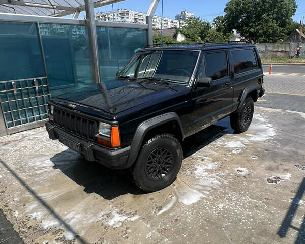 Черный Джип Чероки, объемом двигателя 2.1 л и пробегом 100 тыс. км за 12000 $, фото 11 на Automoto.ua