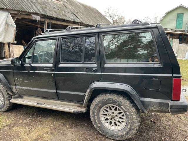 Чорний Джип Cherokee, об'ємом двигуна 4 л та пробігом 350 тис. км за 4200 $, фото 3 на Automoto.ua