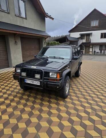 Чорний Джип Cherokee, об'ємом двигуна 4 л та пробігом 290 тис. км за 4450 $, фото 4 на Automoto.ua