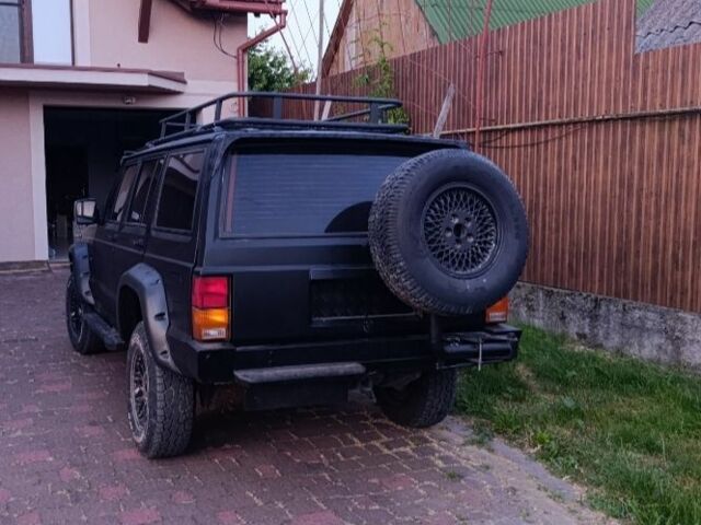 Черный Джип Чероки, объемом двигателя 4 л и пробегом 316 тыс. км за 7500 $, фото 3 на Automoto.ua