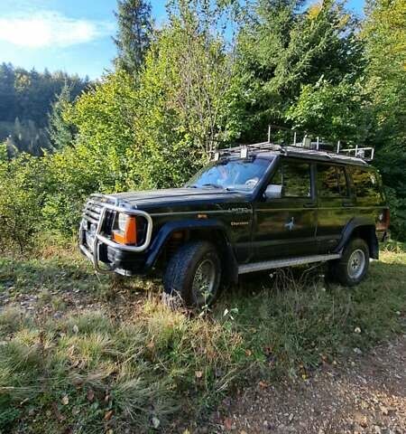 Чорний Джип Cherokee, об'ємом двигуна 4 л та пробігом 322 тис. км за 5800 $, фото 15 на Automoto.ua