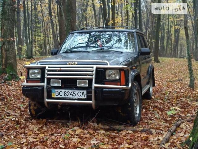 Чорний Джип Cherokee, об'ємом двигуна 4 л та пробігом 322 тис. км за 5800 $, фото 7 на Automoto.ua