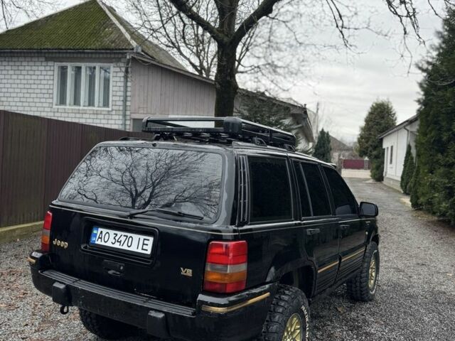 Чорний Джип Cherokee, об'ємом двигуна 5.2 л та пробігом 340 тис. км за 6300 $, фото 3 на Automoto.ua