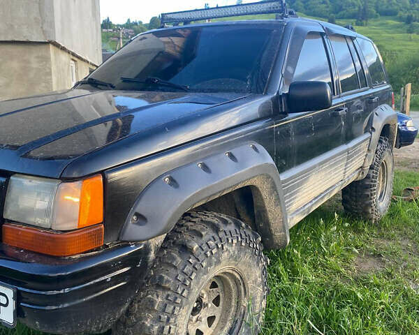Чорний Джип Cherokee, об'ємом двигуна 3.97 л та пробігом 282 тис. км за 6000 $, фото 1 на Automoto.ua