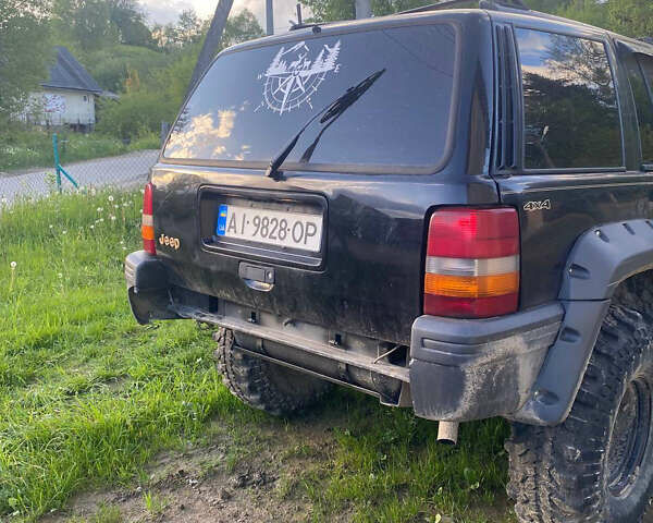 Чорний Джип Cherokee, об'ємом двигуна 3.97 л та пробігом 282 тис. км за 6000 $, фото 5 на Automoto.ua