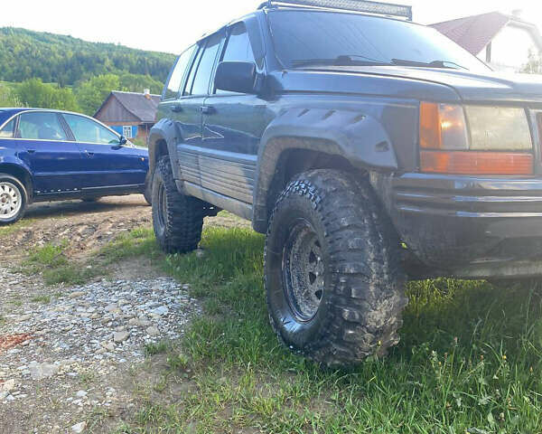 Чорний Джип Cherokee, об'ємом двигуна 3.97 л та пробігом 282 тис. км за 6000 $, фото 3 на Automoto.ua