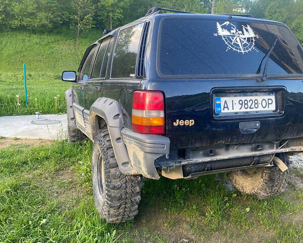 Чорний Джип Cherokee, об'ємом двигуна 3.97 л та пробігом 282 тис. км за 6000 $, фото 2 на Automoto.ua