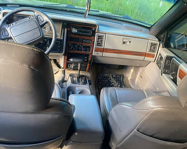 Чорний Джип Cherokee, об'ємом двигуна 3.97 л та пробігом 282 тис. км за 6000 $, фото 6 на Automoto.ua