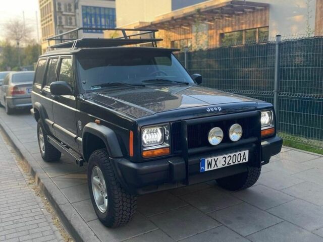 Черный Джип Чероки, объемом двигателя 2.5 л и пробегом 230 тыс. км за 6700 $, фото 1 на Automoto.ua
