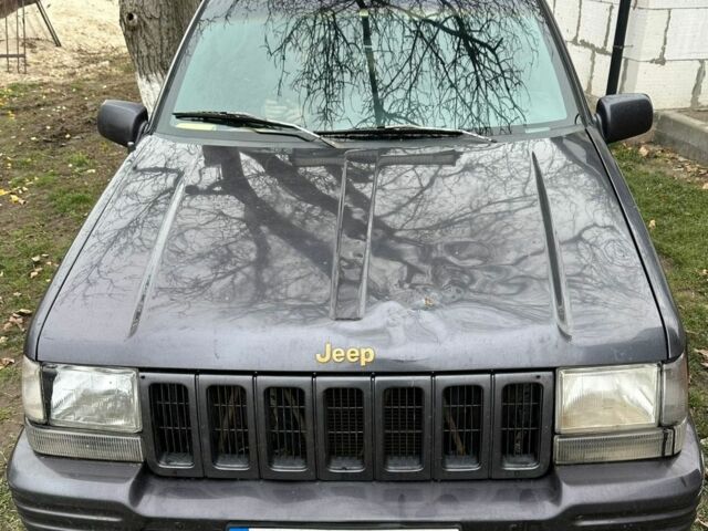 Черный Джип Чероки, объемом двигателя 2.5 л и пробегом 273 тыс. км за 2700 $, фото 1 на Automoto.ua